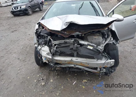 2014 Toyota Prius C Four from USA, damaged, VIN JTDKDTB34E1078028